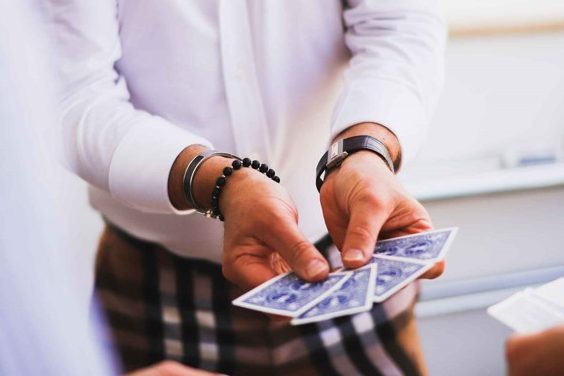 Richard Stooker fanning a deck of cards