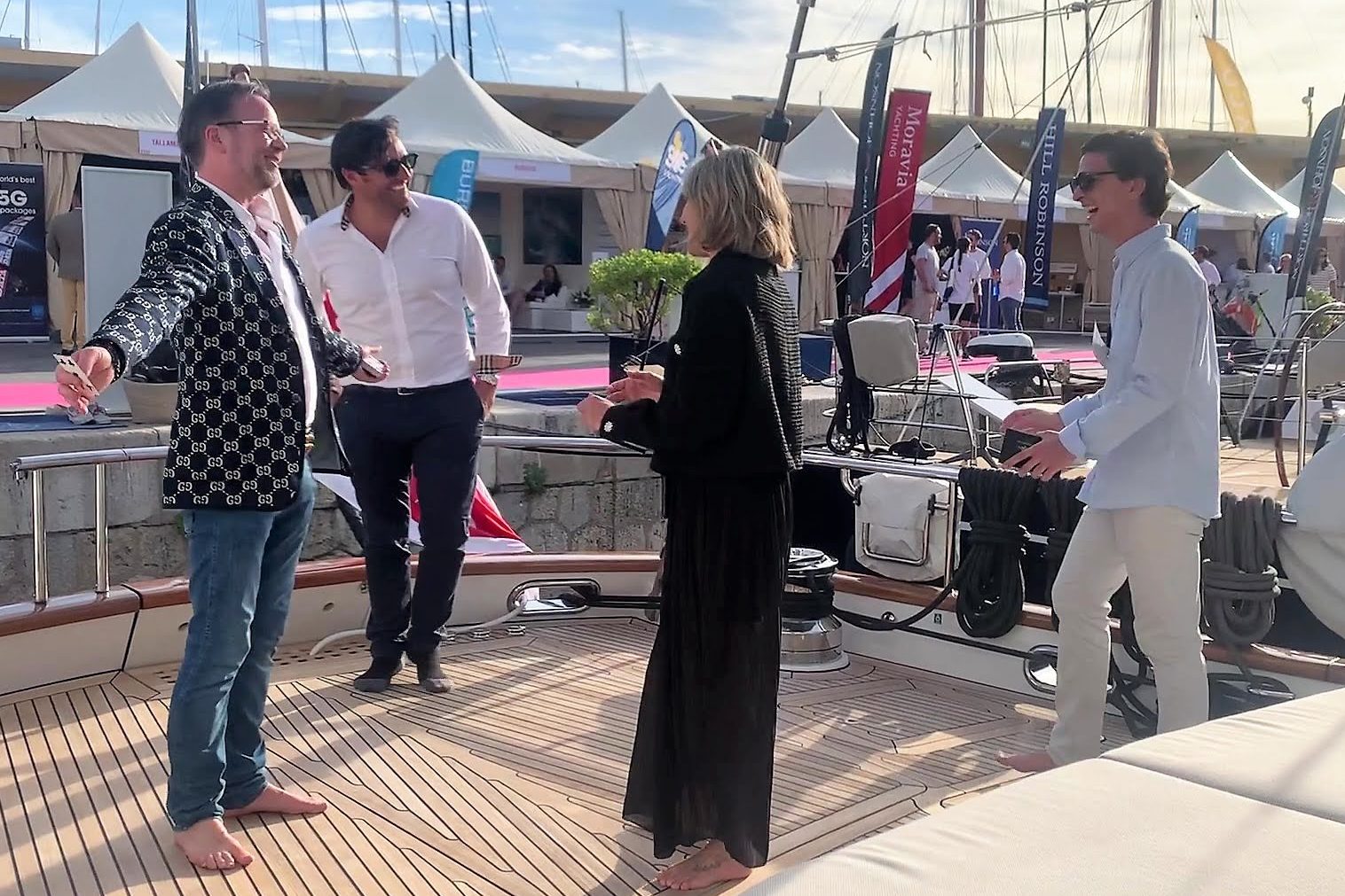 Yacht guests amazed by a magic trick